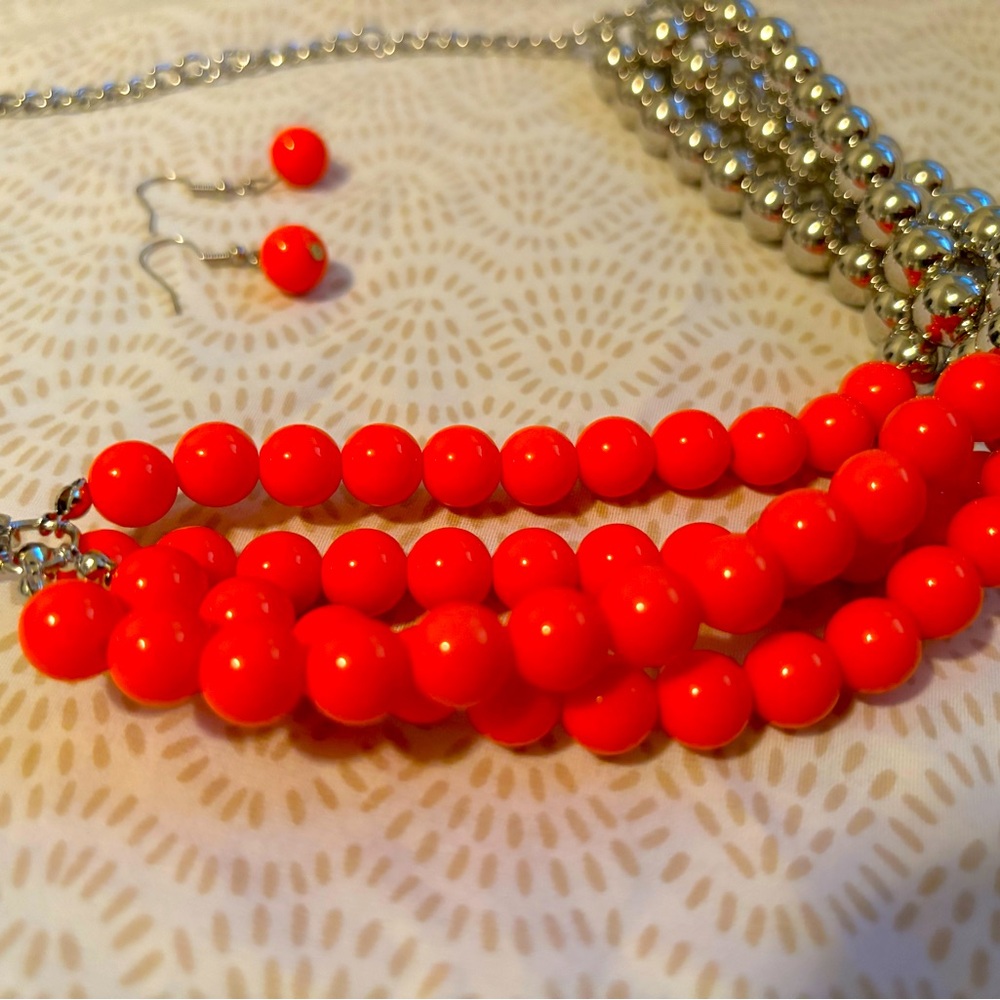 Orange and chrome necklace and earring set